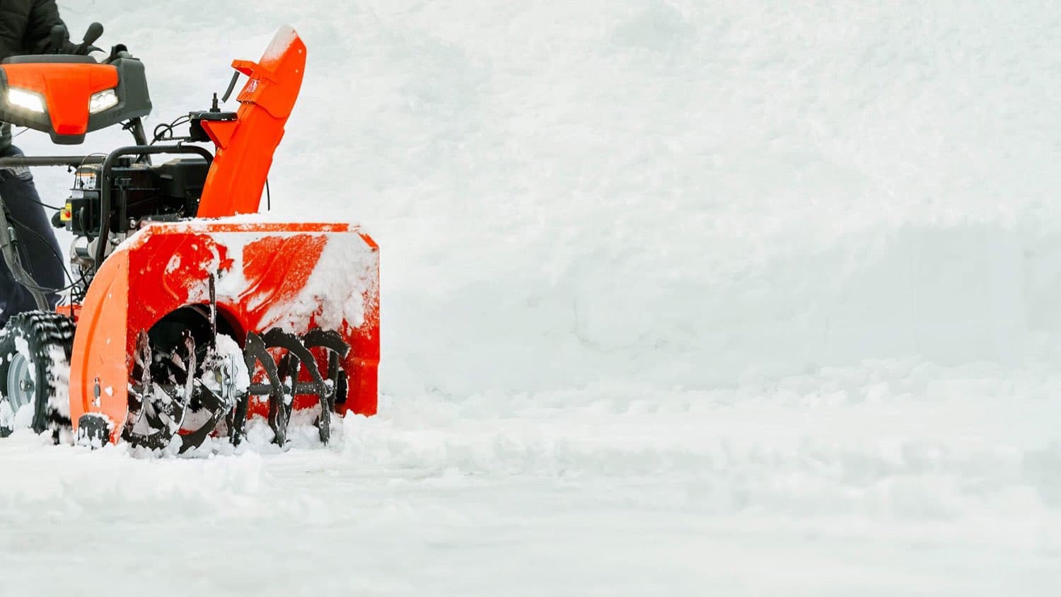 Snow blower clearing deep snow